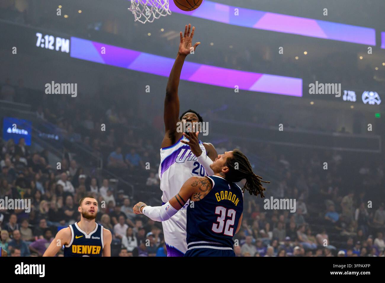 Utah Jazz forward Jaren Jackson Jr. (20) shoots over Denver Nuggets ...