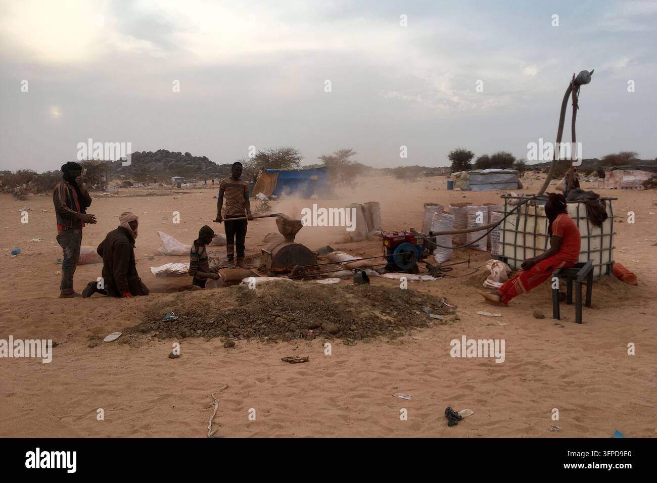 File Size Px FILE - Gold panners break stones in Kidal, Mali, on Jan. 23, 2020. (AP ...