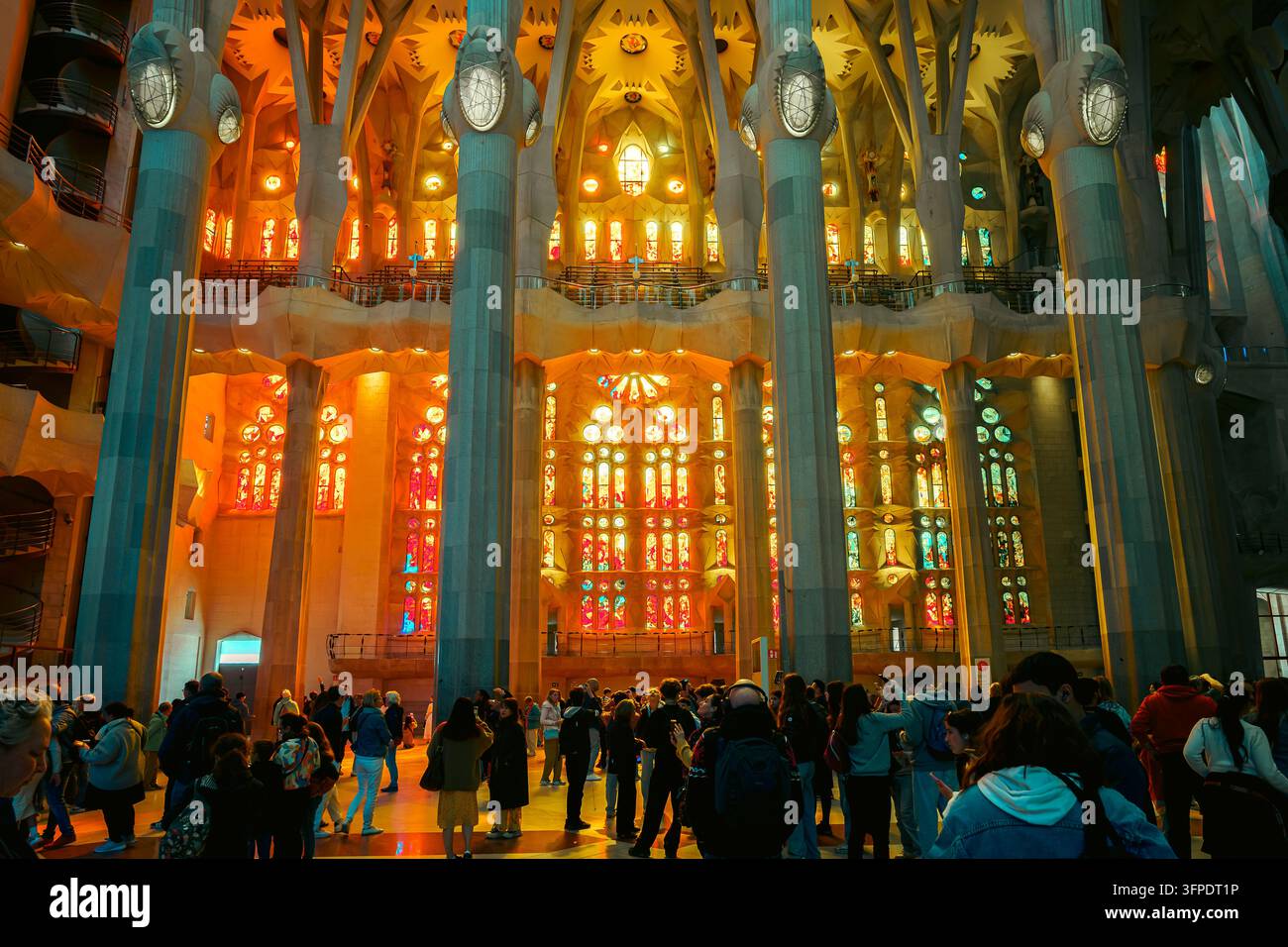 Beneath tall stained glass windows inside hi-res stock photography and ...