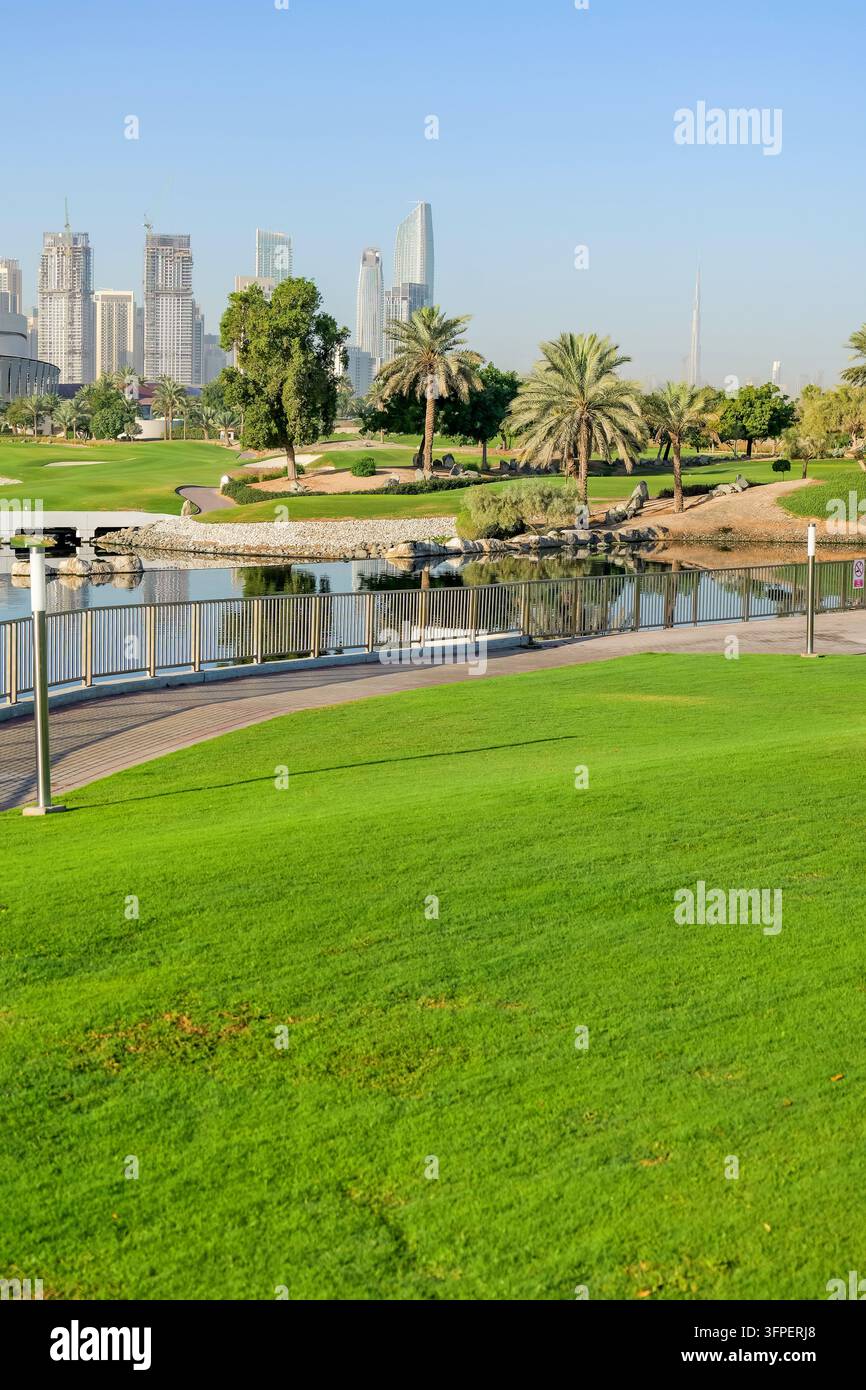 Course Development Model Image Modern Dubai Creek Harbour skyline surrounded by green golf course ...