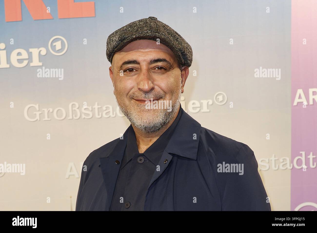 Oezguer Karadeniz attends the photo call for the 40th anniversary of ...