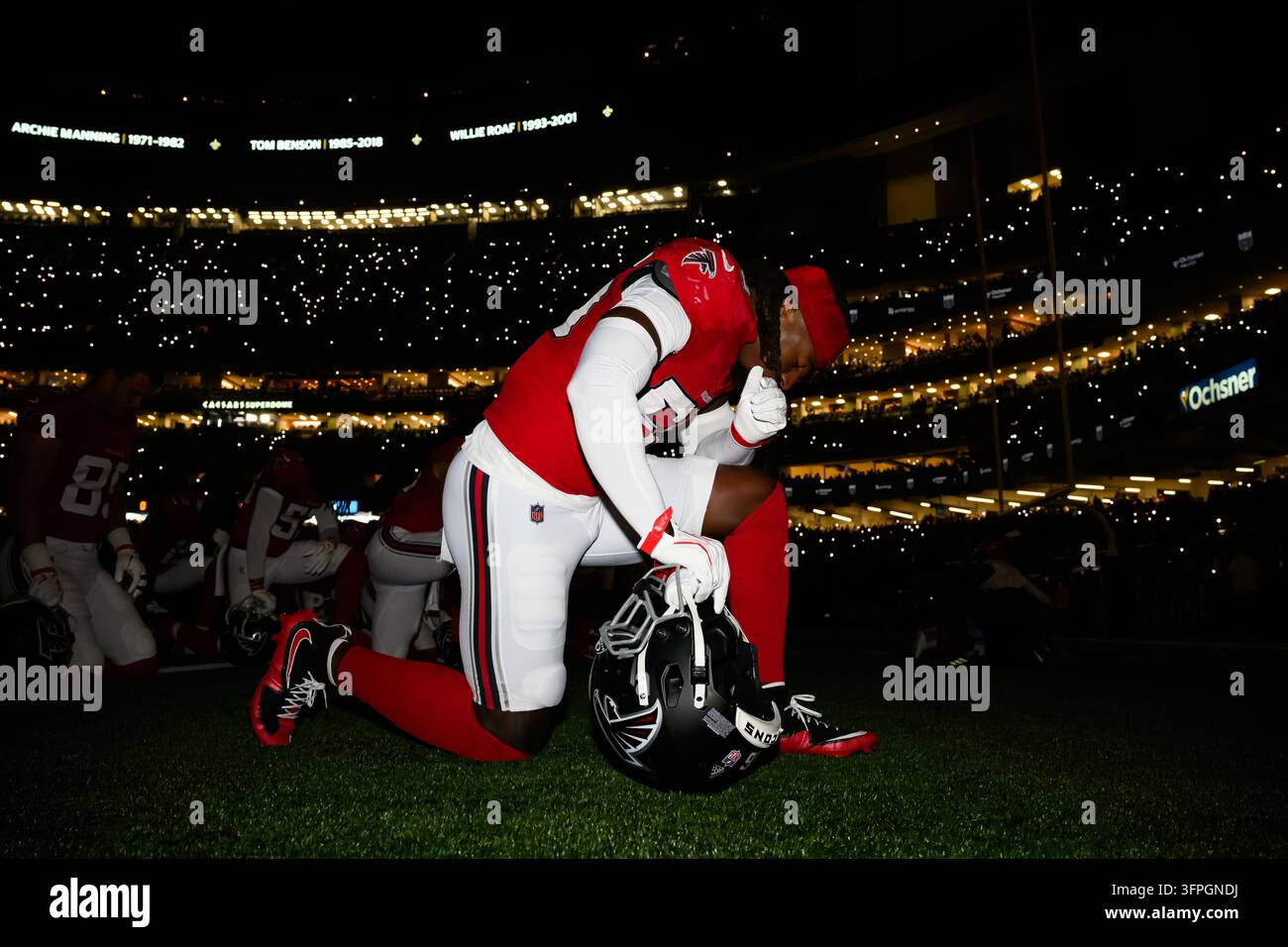 Atlanta Falcons linebacker Harold Perkins Jr. (56) kneels during pregame of an NFL Monday Night ...