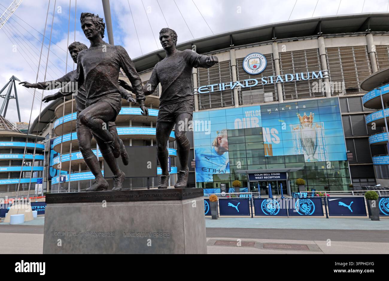 Close view of Manchester City legends Lee Bell and Summerbee statue at the Etihad Stadium Stock Photo