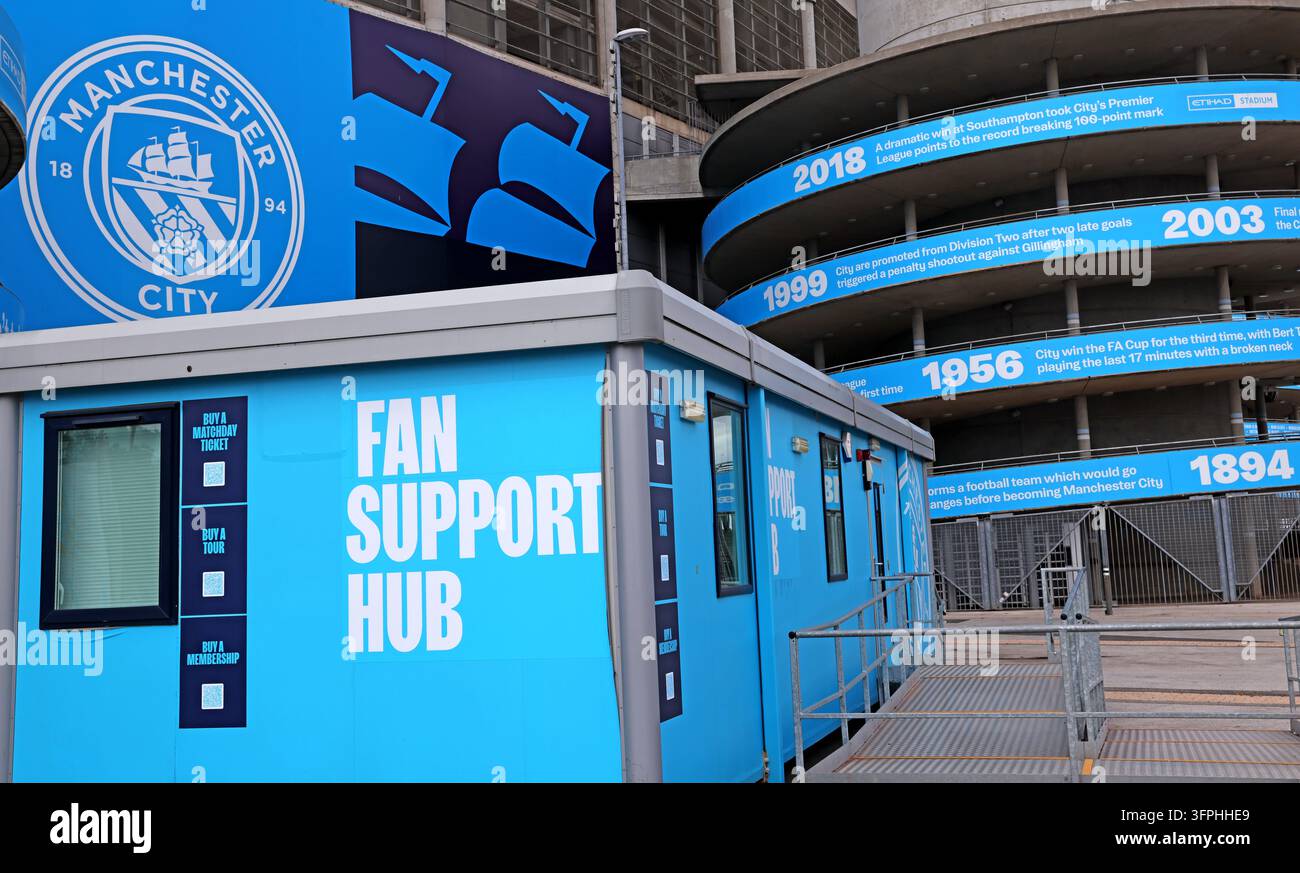 Manchester City Fan Support Hub at the Etihad Stadium with bright blue club signage Stock Photo