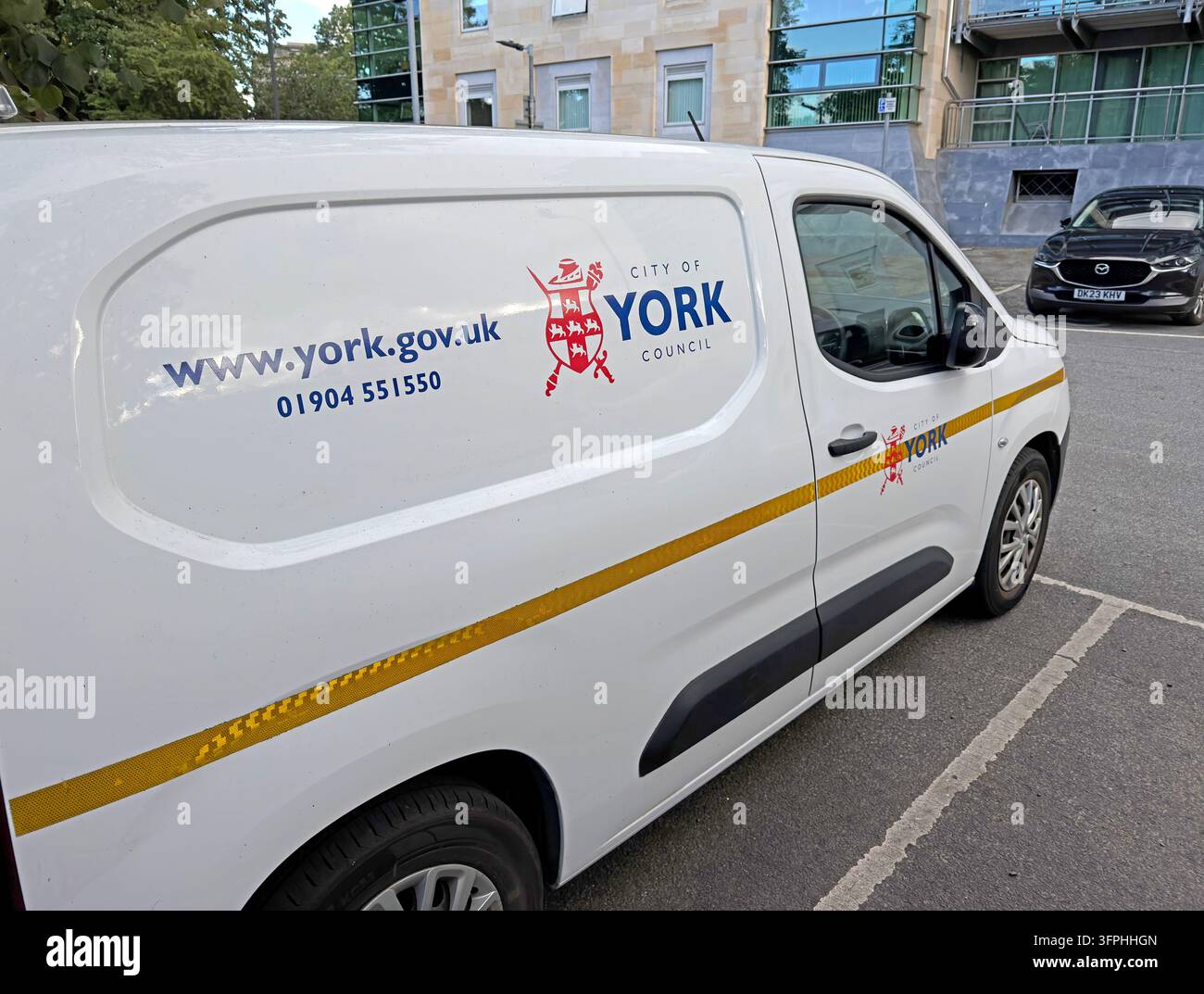 City of York Council service vehicle parked in York with council crest and website Stock Photo