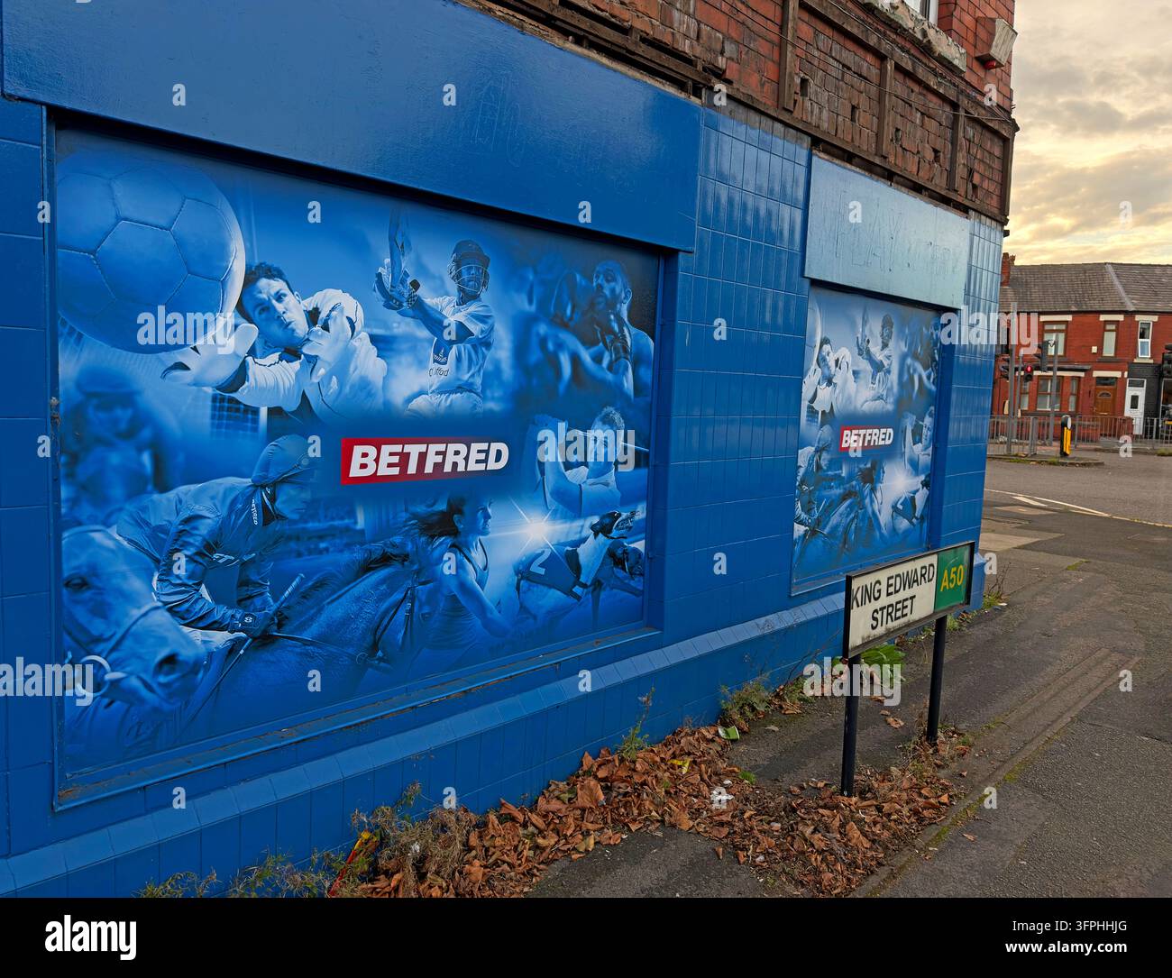 Closed Betfred bookmaker shopfront with covered windows in Padgate Warrington Stock Photo