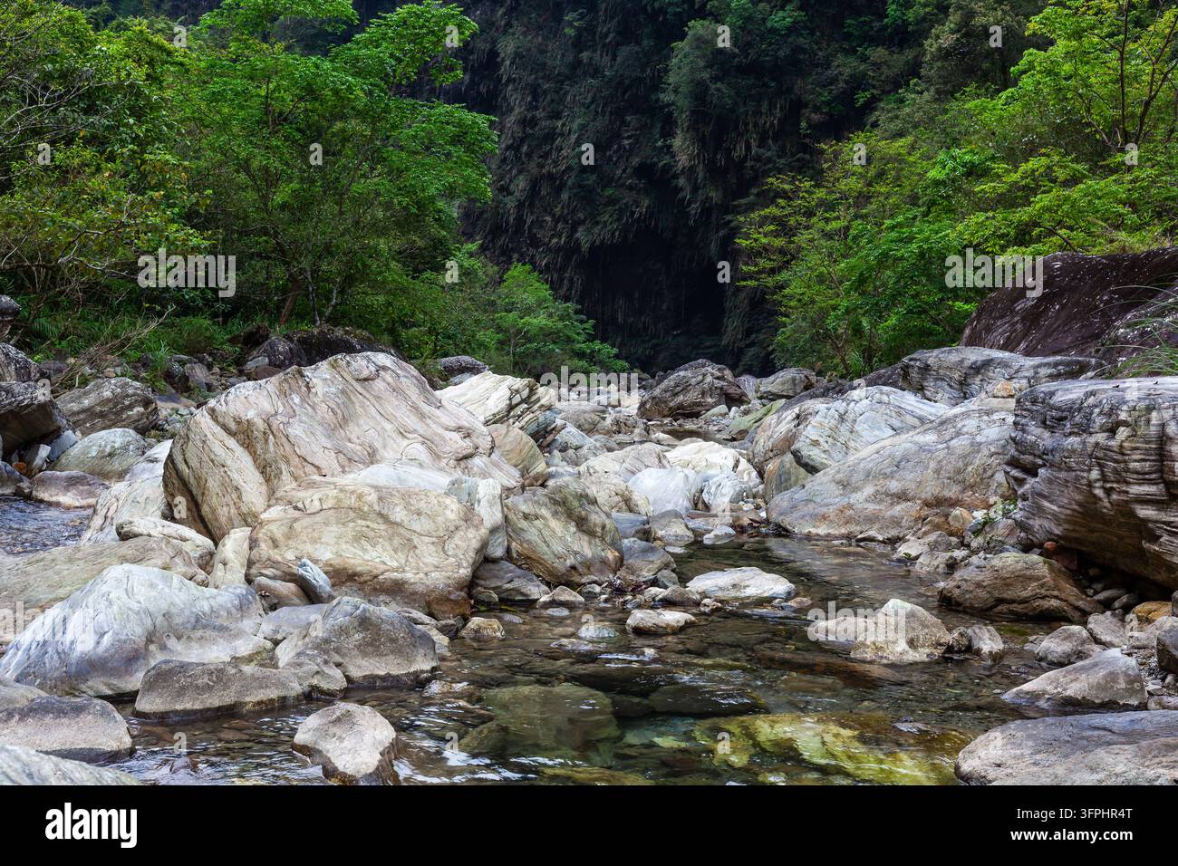 Sanzhanxi River Valley in Hualien, Taiwan. Large white rocks and clear ...