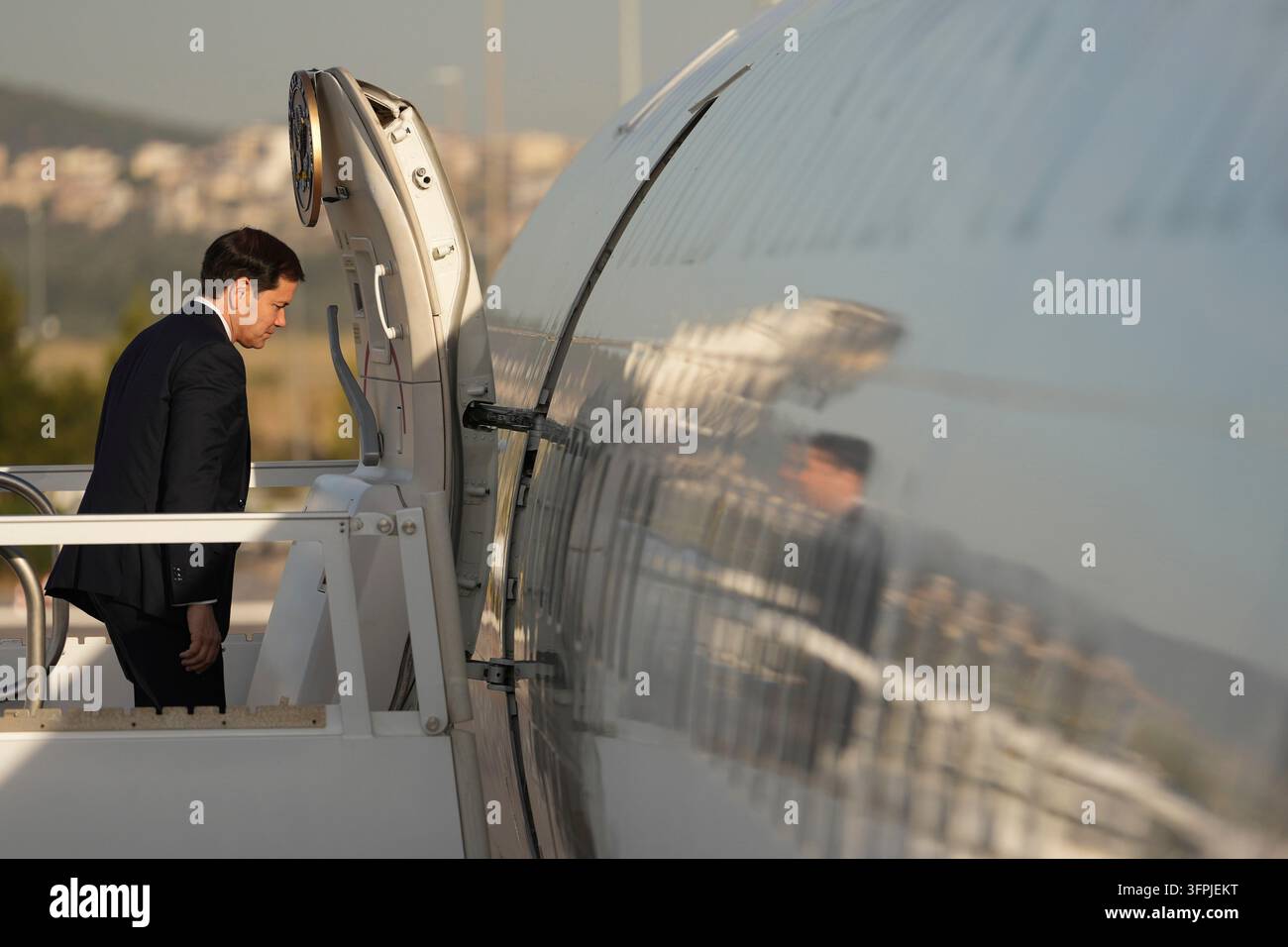 U.S. Secretary of State Marco Rubio boards a plane Thursday, Oct. 8 ...