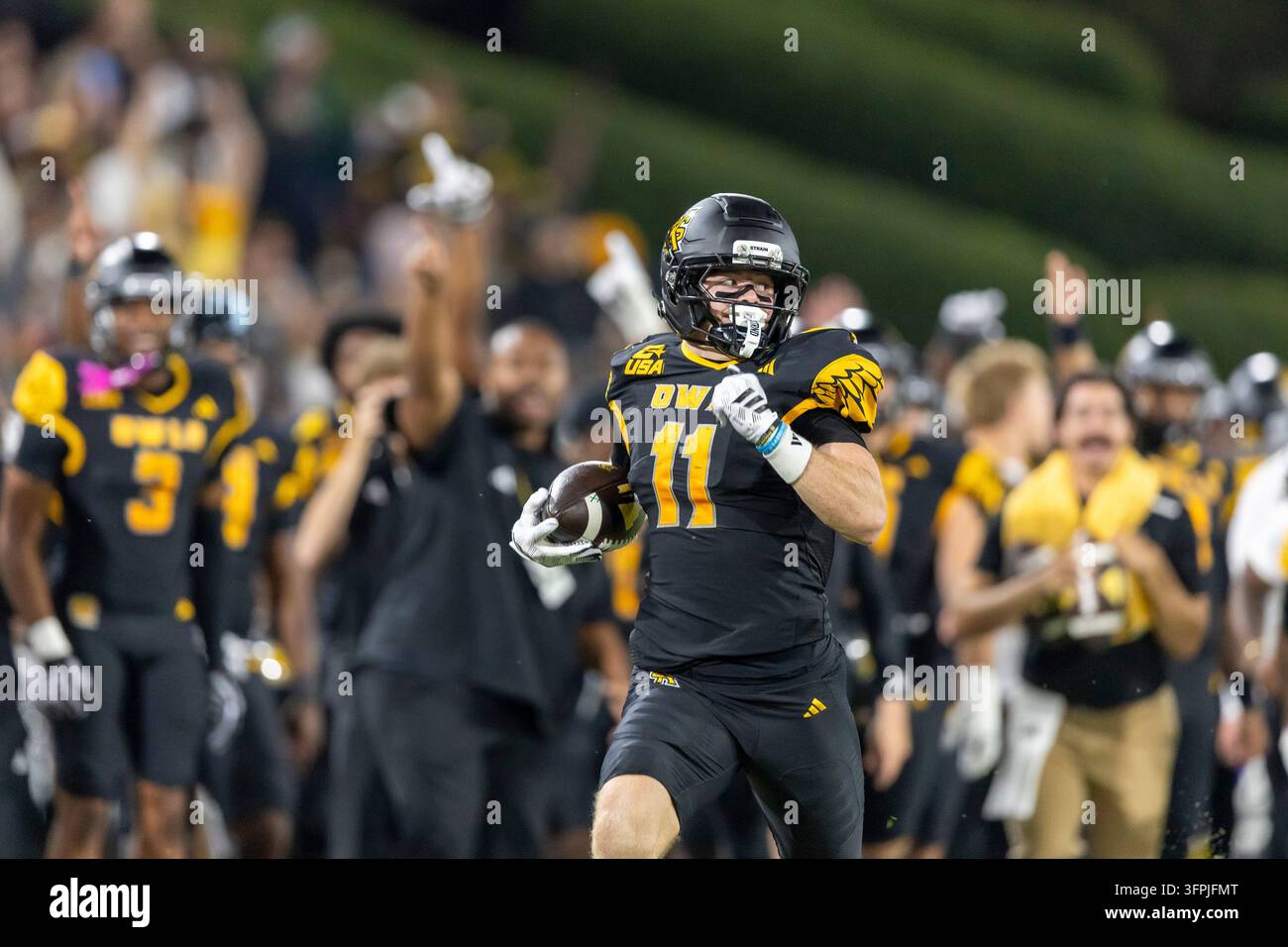 Kennesaw State wide receiver Brayden Munroe (11) breaks a long play ...