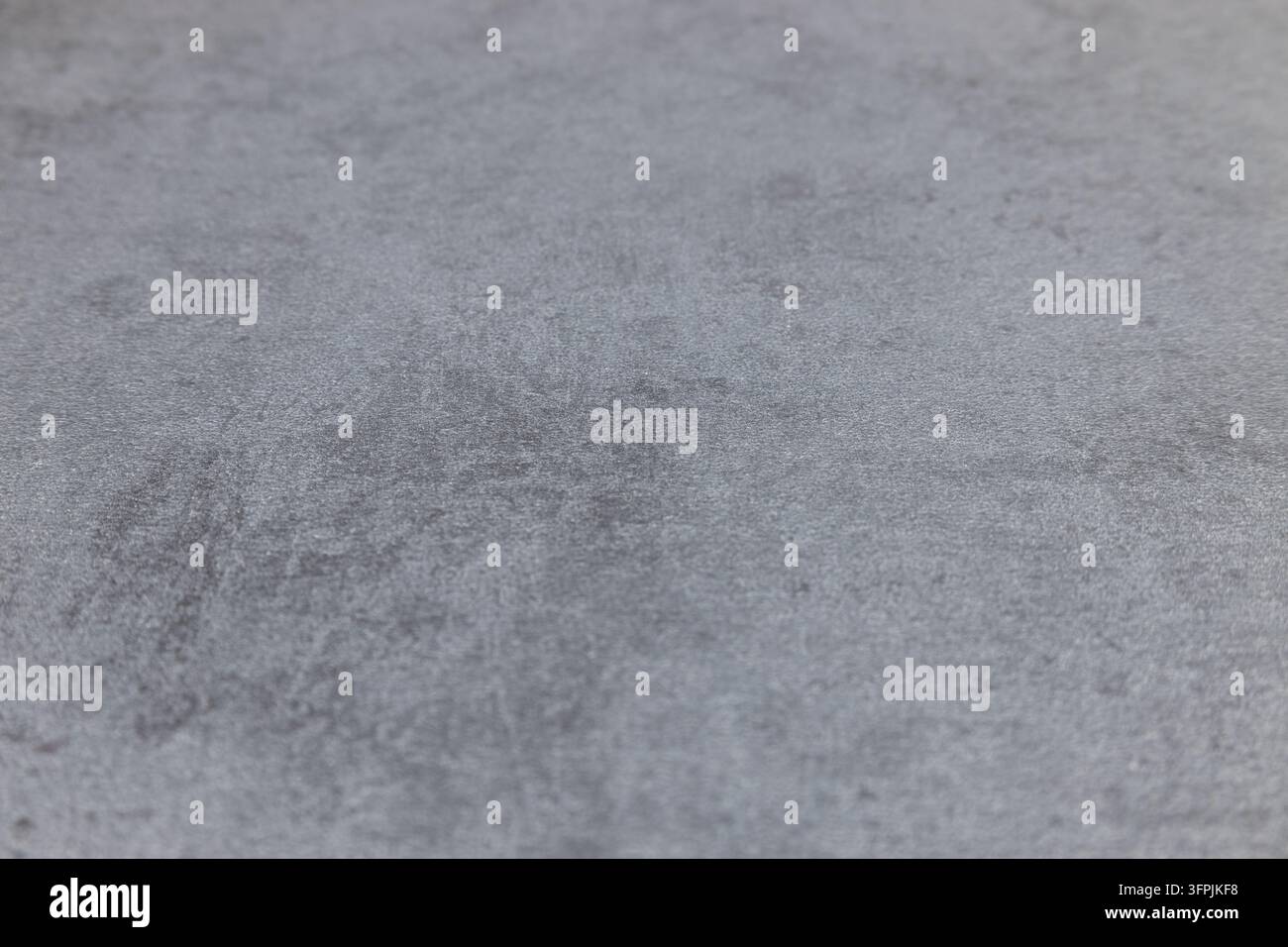 Gray stone surface background with subtle speckled pattern Stock Photo