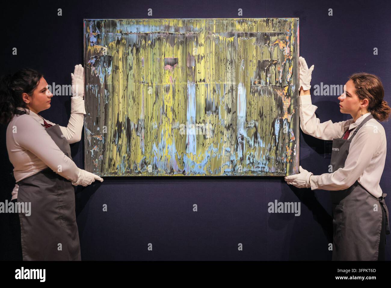 London, UK. 08th Sep 2026. Christie's art handlers with Gerhard Richter ...