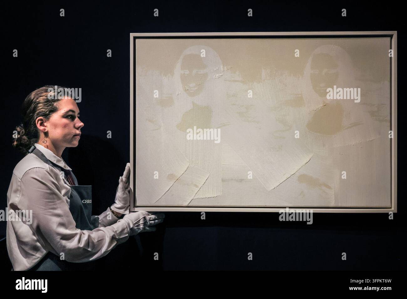 London, UK. 08th Sep 2026. Christie's art handlers with Andy Warhol ...