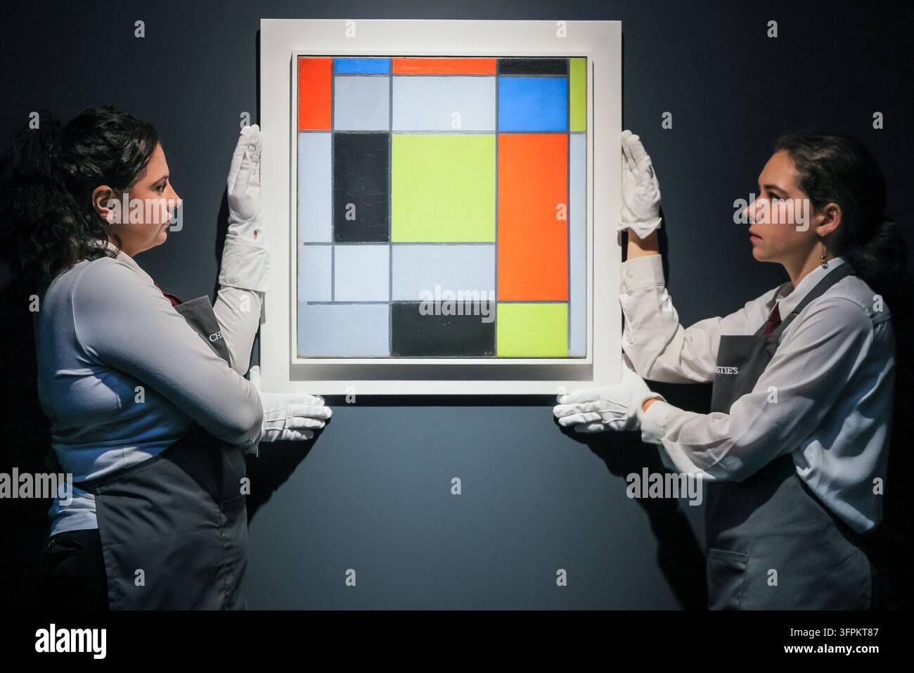 London, UK. 08th Sep 2026. Christie's art handlers with Piet Mondrian ...