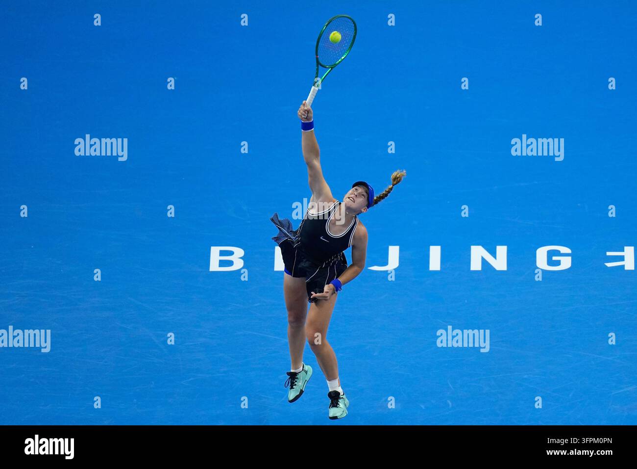 Mirra Andreeva, of Russia, serve to Ekaterina Alexandrova, of Russia during the quarterfinals of ...