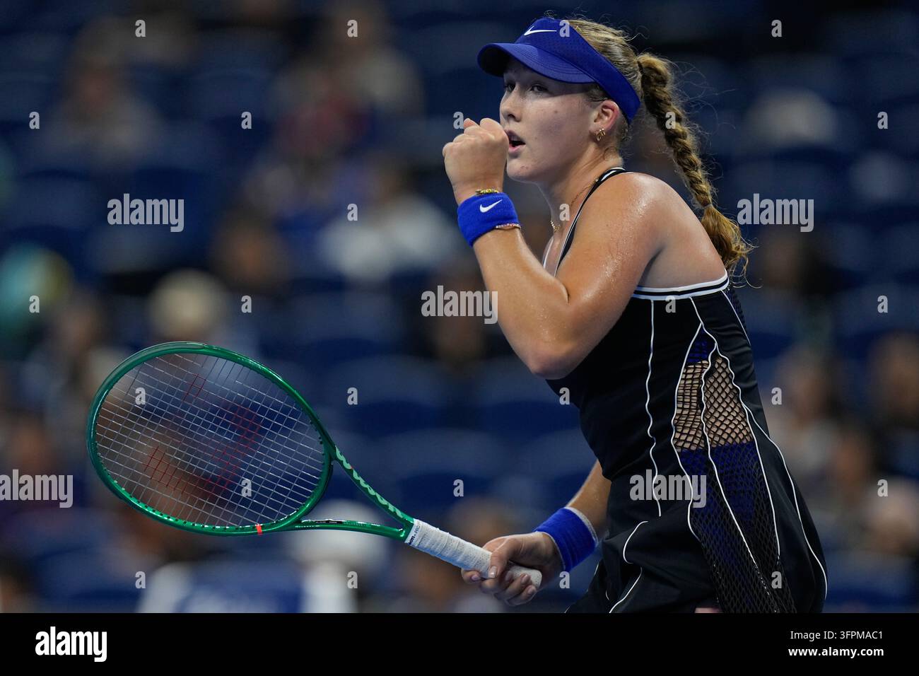 Mirra Andreeva, of Russia, celebrates winning a point against Ekaterina Alexandrova, of Russia ...