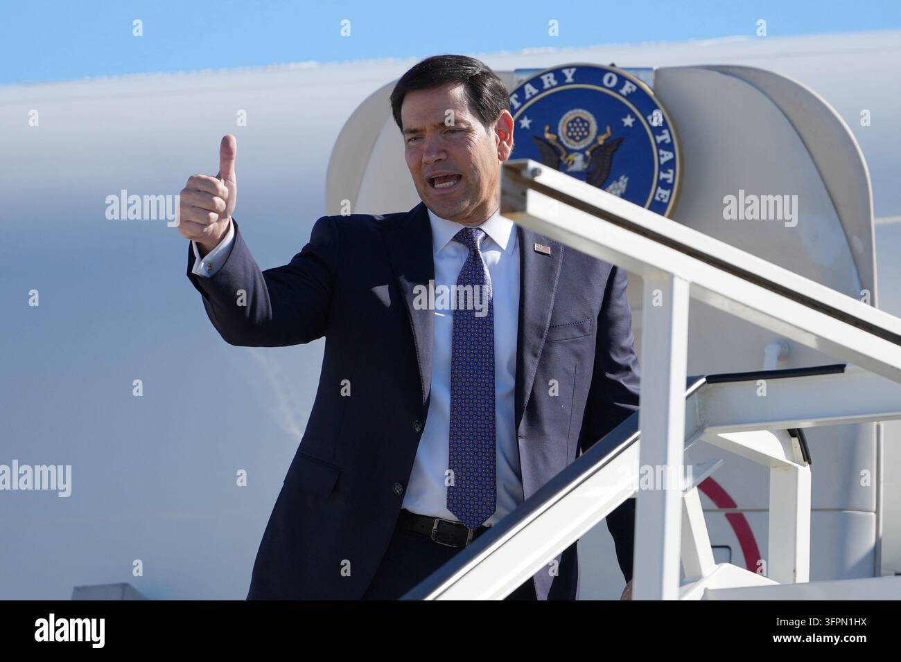 U.S. Secretary of State Marco Rubio boards a plane Thursday, Oct. 8 ...