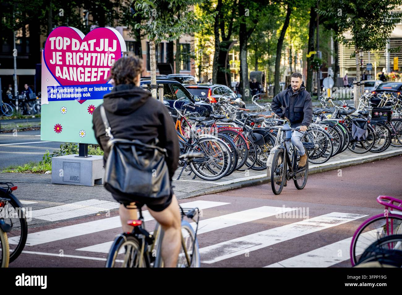8 Sign Direction AMSTERDAM - Great that you indicate your direction on a bike path sign ...
