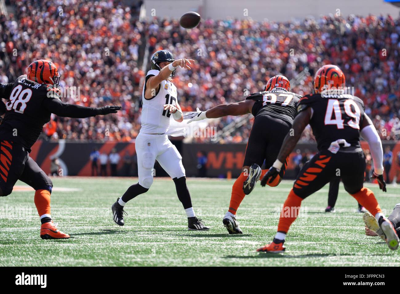 Jacksonville Jaguars quarterback Trevor Lawrence (16) throws during an ...
