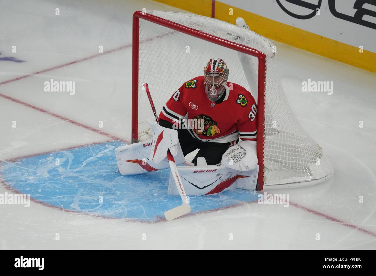 Chicago Blackhawks goaltender Spencer Knight (30) plays against the St ...