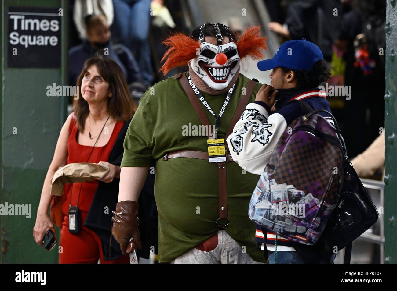 Square Rout Pic Jason Valentine, dresses as the video character 'Sweet Tooth' stands on ...