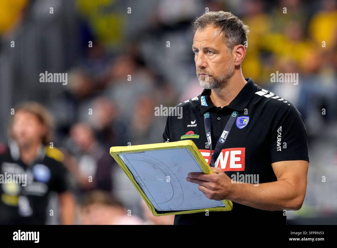 Se Rnl File Maik Machulla (Coach, Head Coach, RNL) with tactical board, single ...