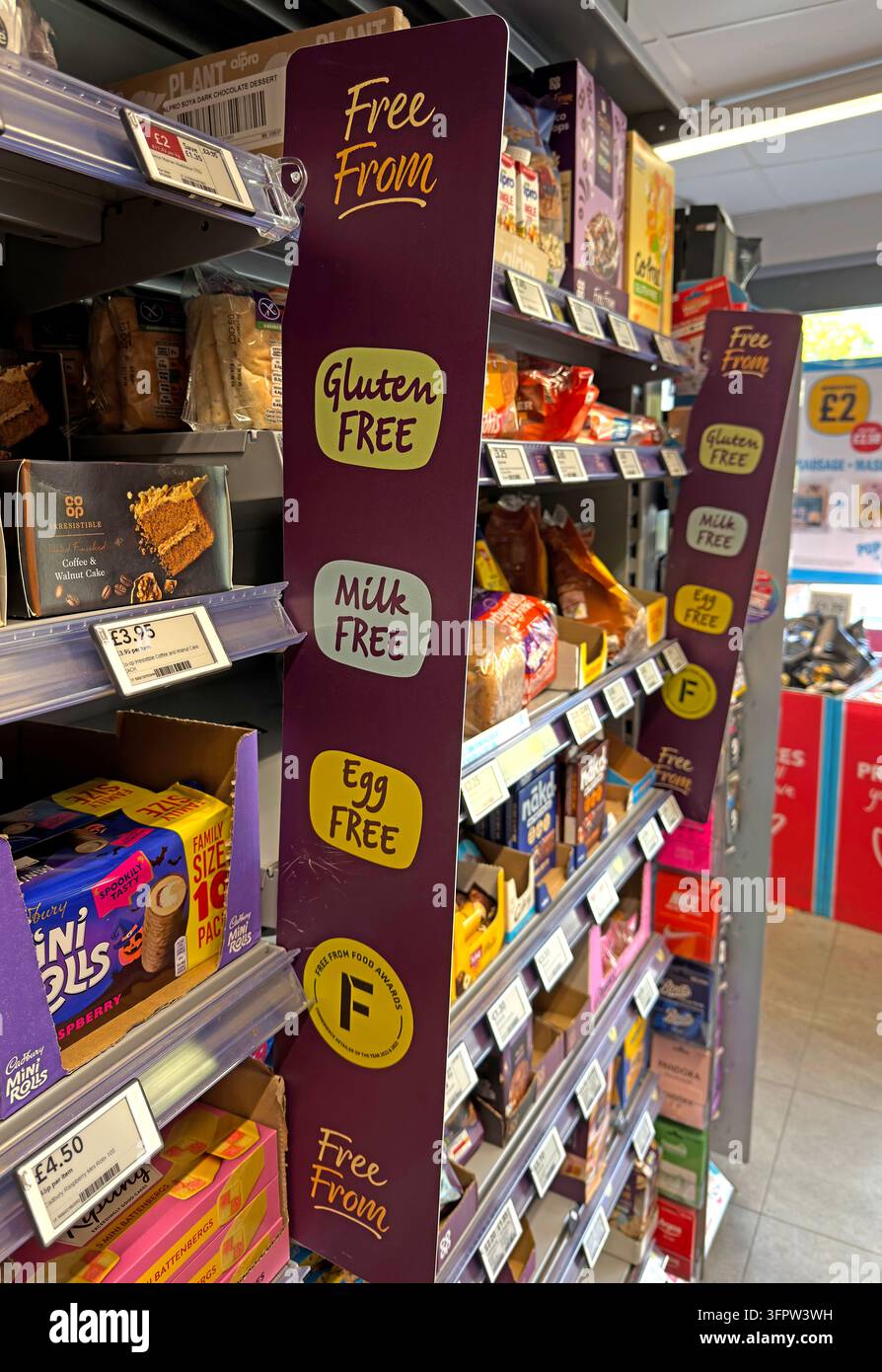 A supermarket Free From section displays packaged food products marketed to shoppers with particular dietary requirements. Stock Photo