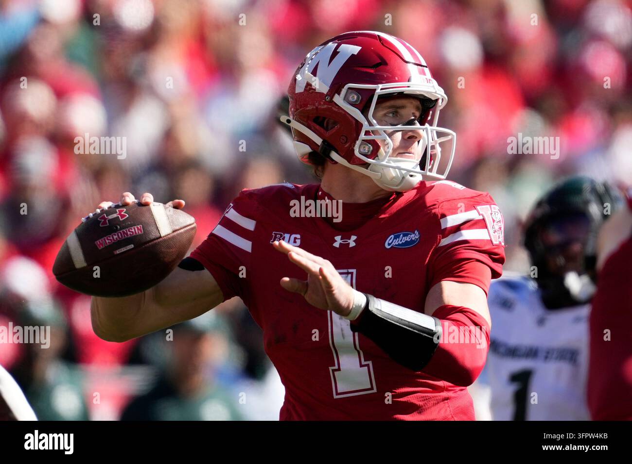 Wisconsin's Colton Joseph throws during an NCAA college football game ...