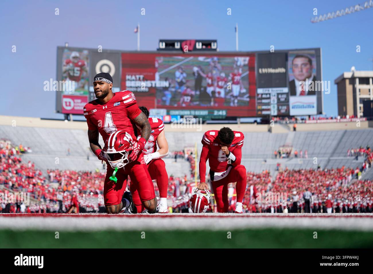 Wisconsin's Marvin Burks Jr. looks on before an NCAA college football ...