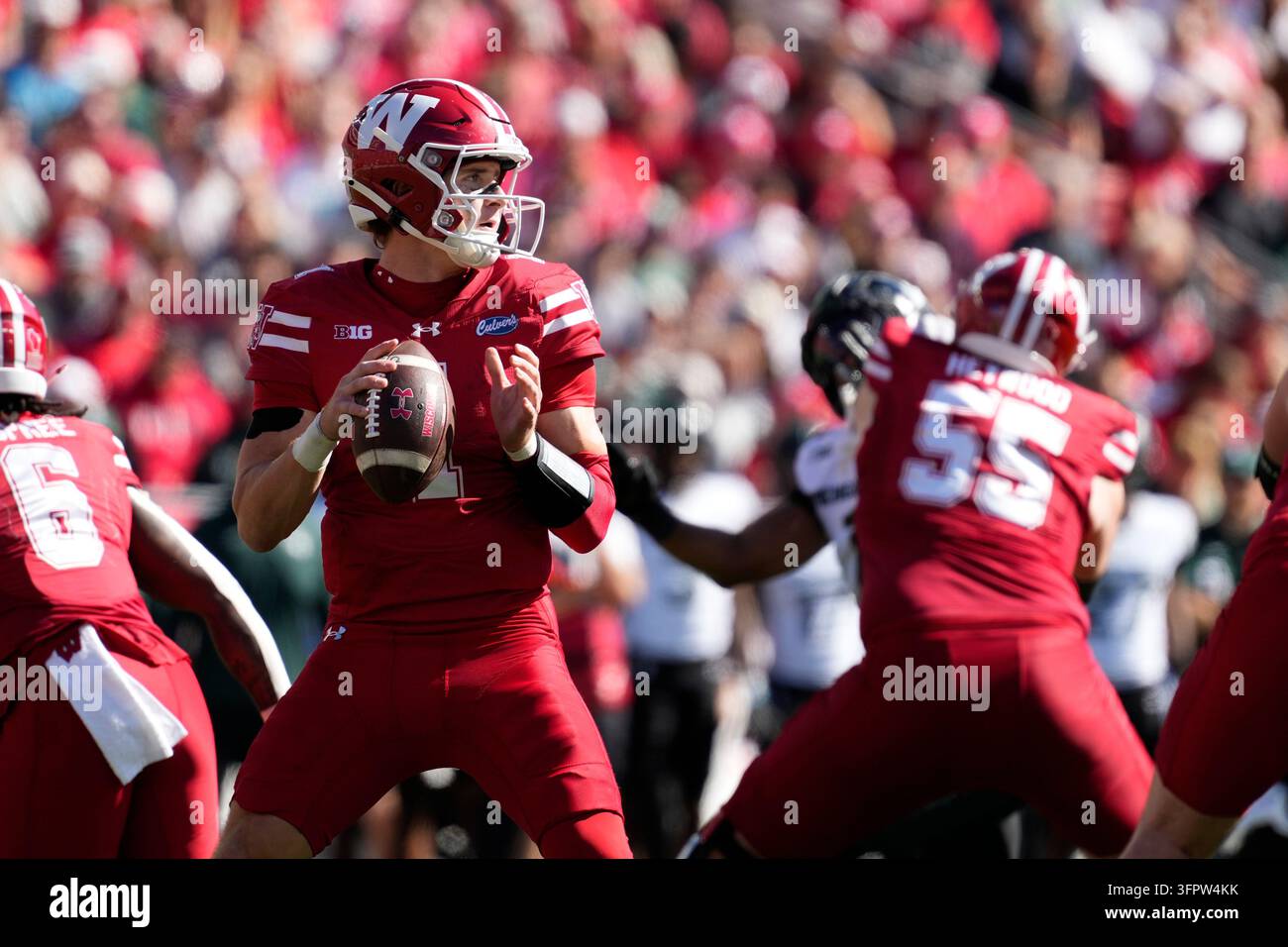 Wisconsin's Colton Joseph throws during an NCAA college football game ...