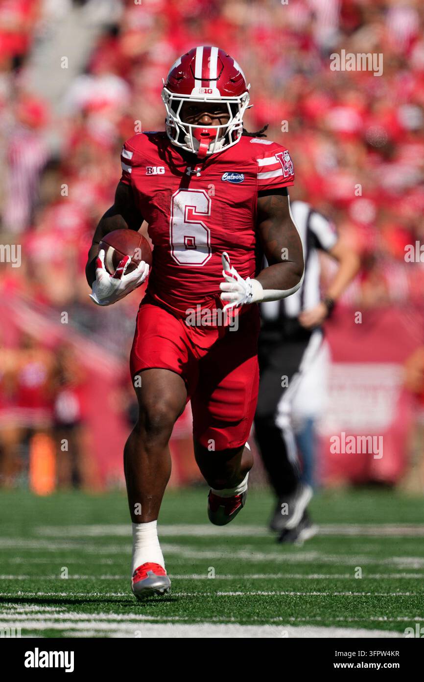 Wisconsin's Darrion Dupree runs during an NCAA college football game ...