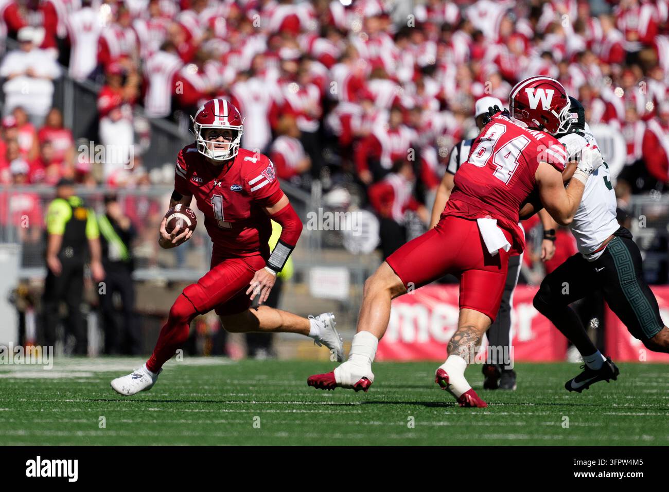 Wisconsin's Colton Joseph runs during an NCAA college football game ...