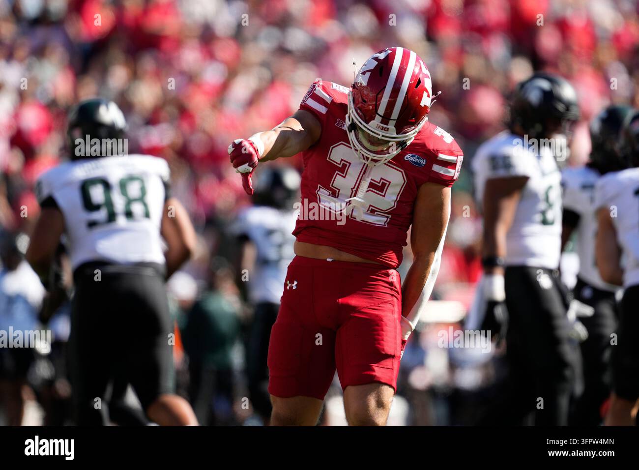 Wisconsin's Harrison Bortolotti gestures during an NCAA college ...
