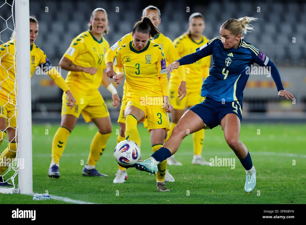 Lithuania's Laura Kubiliute, center, and Sweden's Hanna Lundkvist ...
