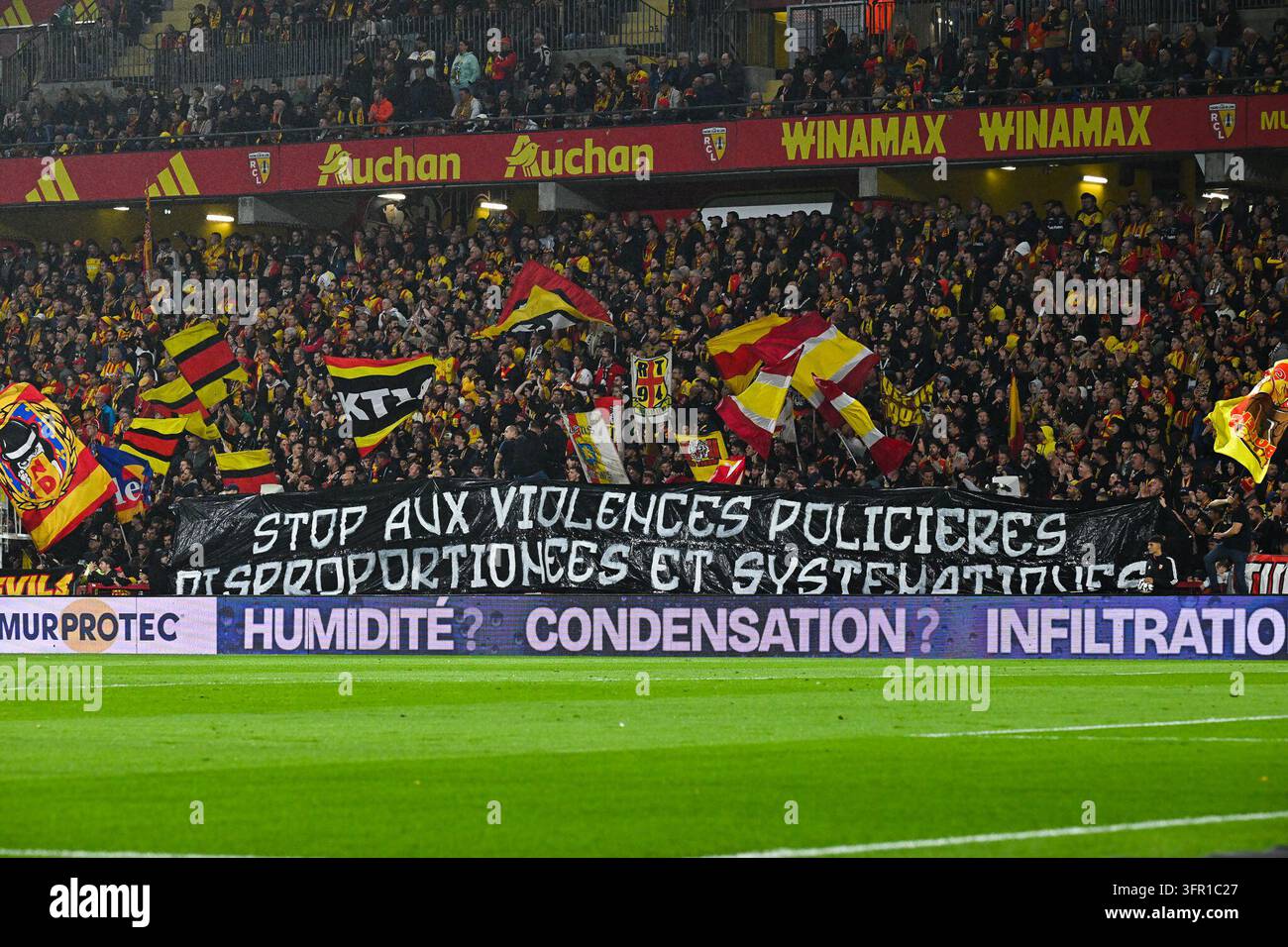 Fans Lens banner against the Police during Ligue 1 McDonald's match ...