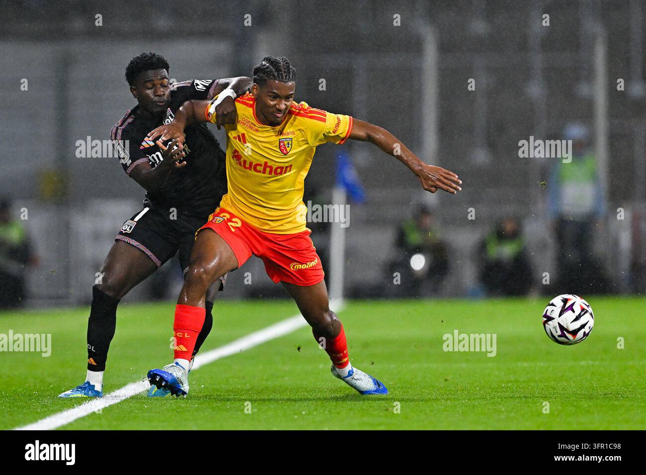 Ernest NUAMAH of Lyon and Kyllian ANTONIO of Lens during Ligue 1 ...