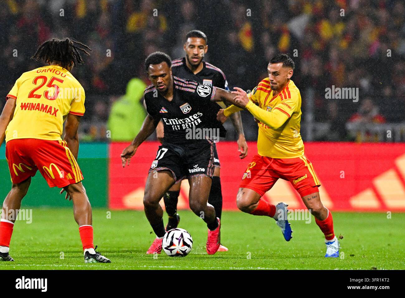 Lois OPENDA of Lyon and Ruben AGUILAR of Lens during Ligue 1 McDonald's ...