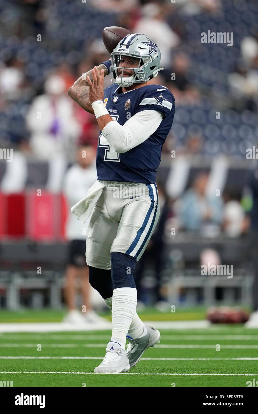 Dallas Cowboys quarterback Dak Prescott warms up before an NFL football ...