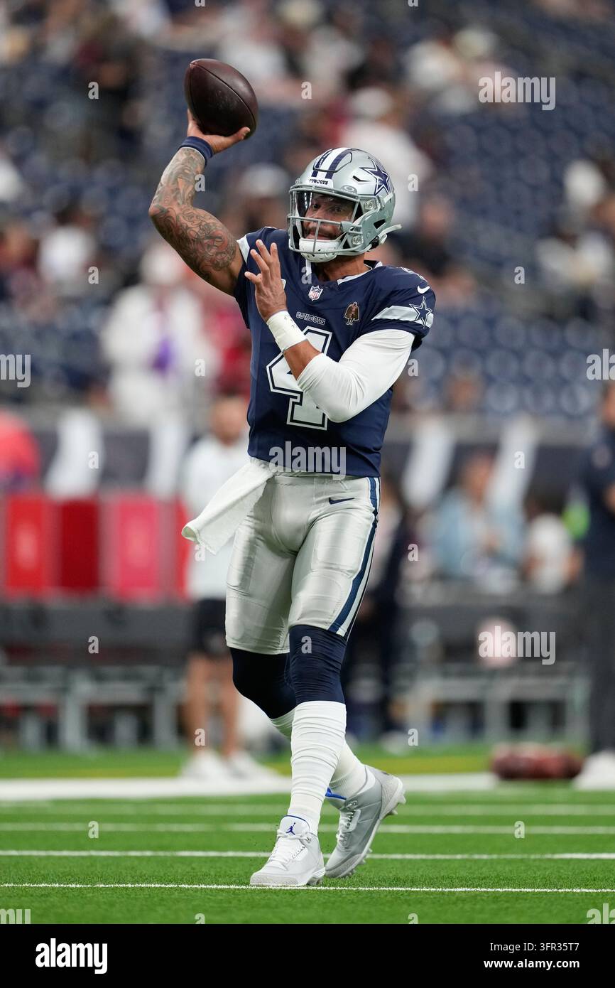 Dallas Cowboys quarterback Dak Prescott warms up before an NFL football ...