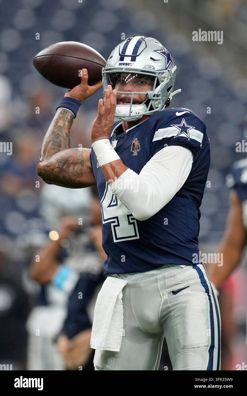 Dallas Cowboys quarterback Dak Prescott warms up before an NFL football ...