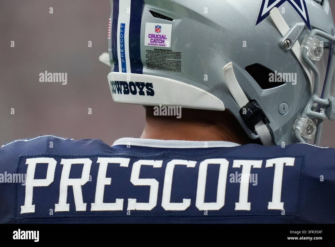 Dallas Cowboys quarterback Dak Prescott wears a Crucial Catch sticker ...