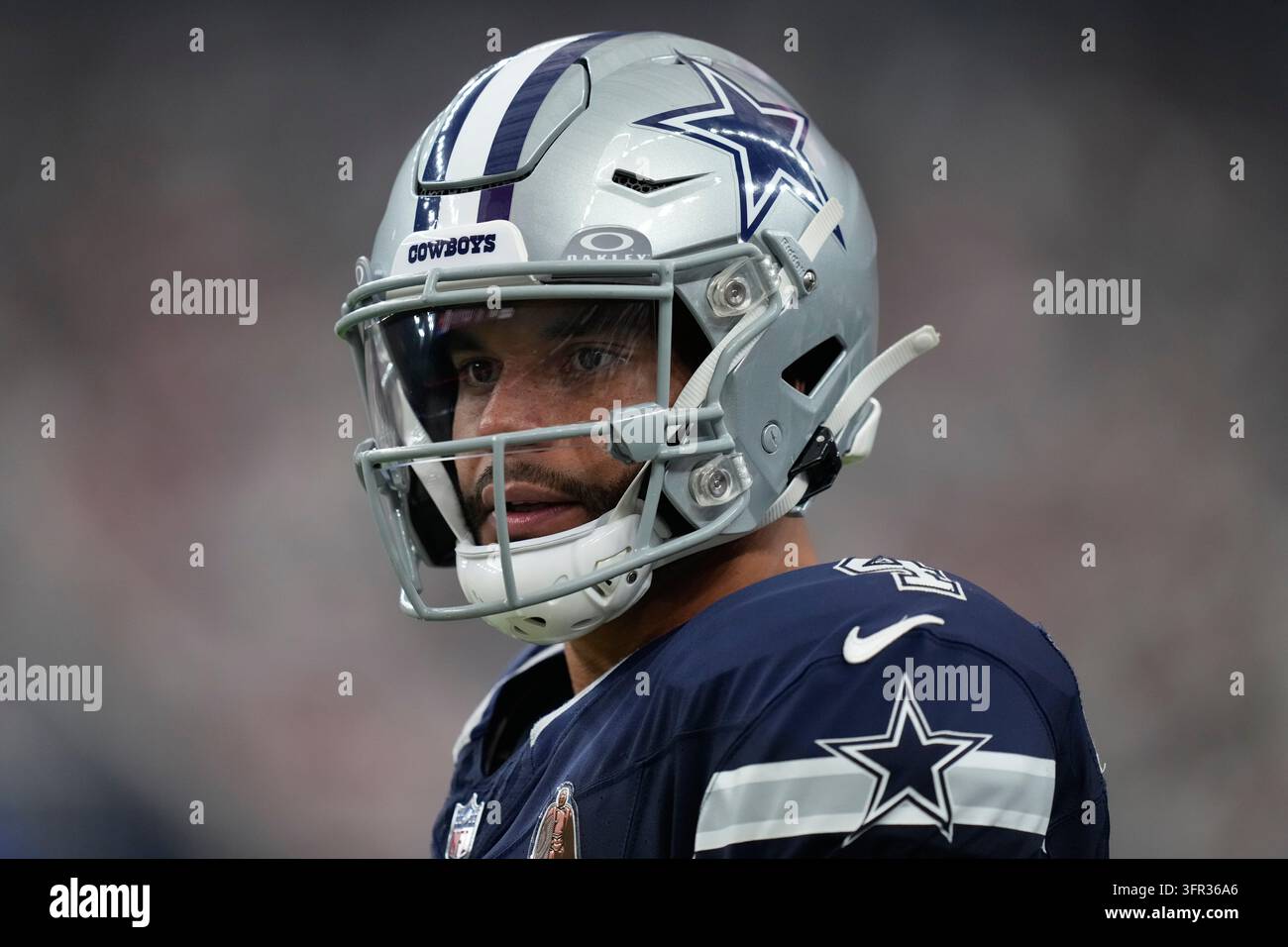 Dallas Cowboys quarterback Dak Prescott stands on the sideline during ...