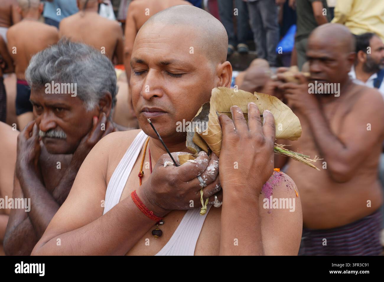 Perform Rituals Hindu devotees perform rituals on the occasion of Mahalaya, an ...