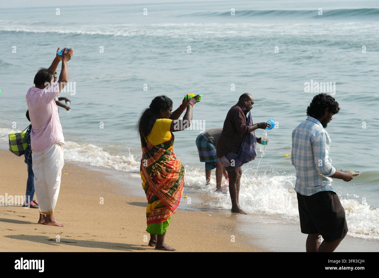 Perform Rituals Hindu devotees perform rituals on the occasion of Mahalaya, an ...