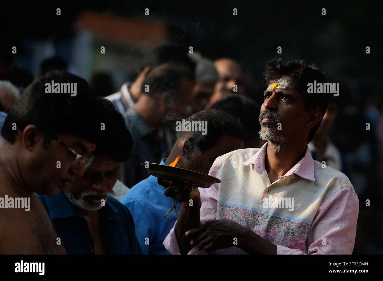 Perform Rituals Hindu devotees perform rituals on the occasion of Mahalaya, an ...