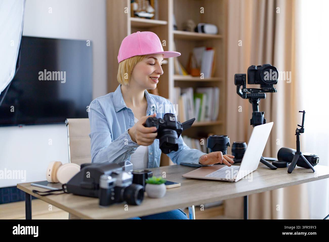 Content Creator Working With Camera Stock Photo