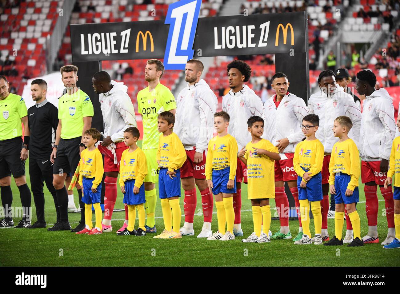 Team of Monaco pay tribute to Pink October and kids using a pink ribbon ...