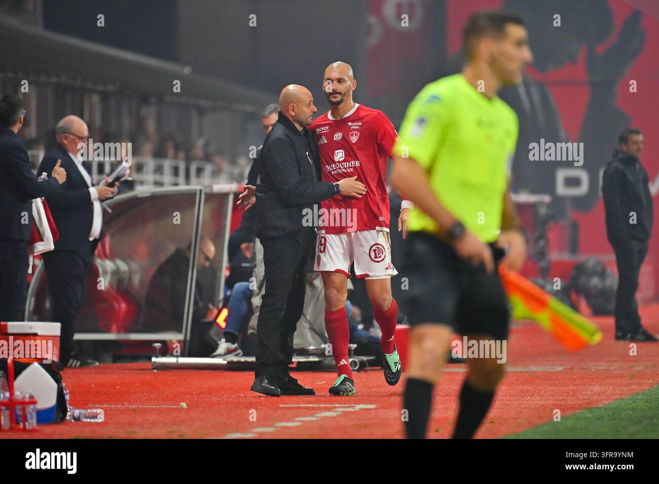 Ludovic AJORQUE of Brest and Julien LACHUER head coach of Stade ...