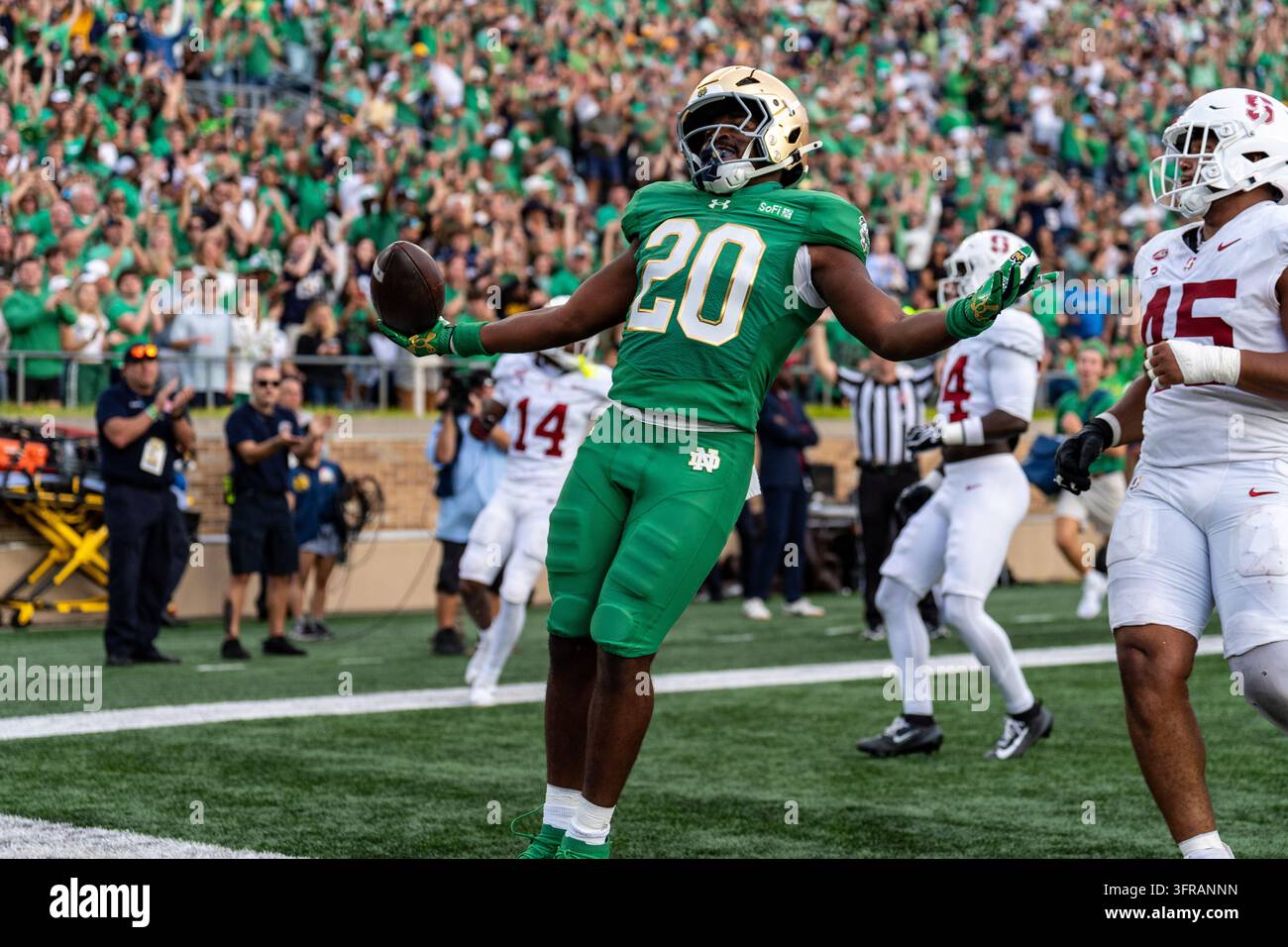 Notre Dame running back Jonaz Walton (20) celebrates his touchdown ...