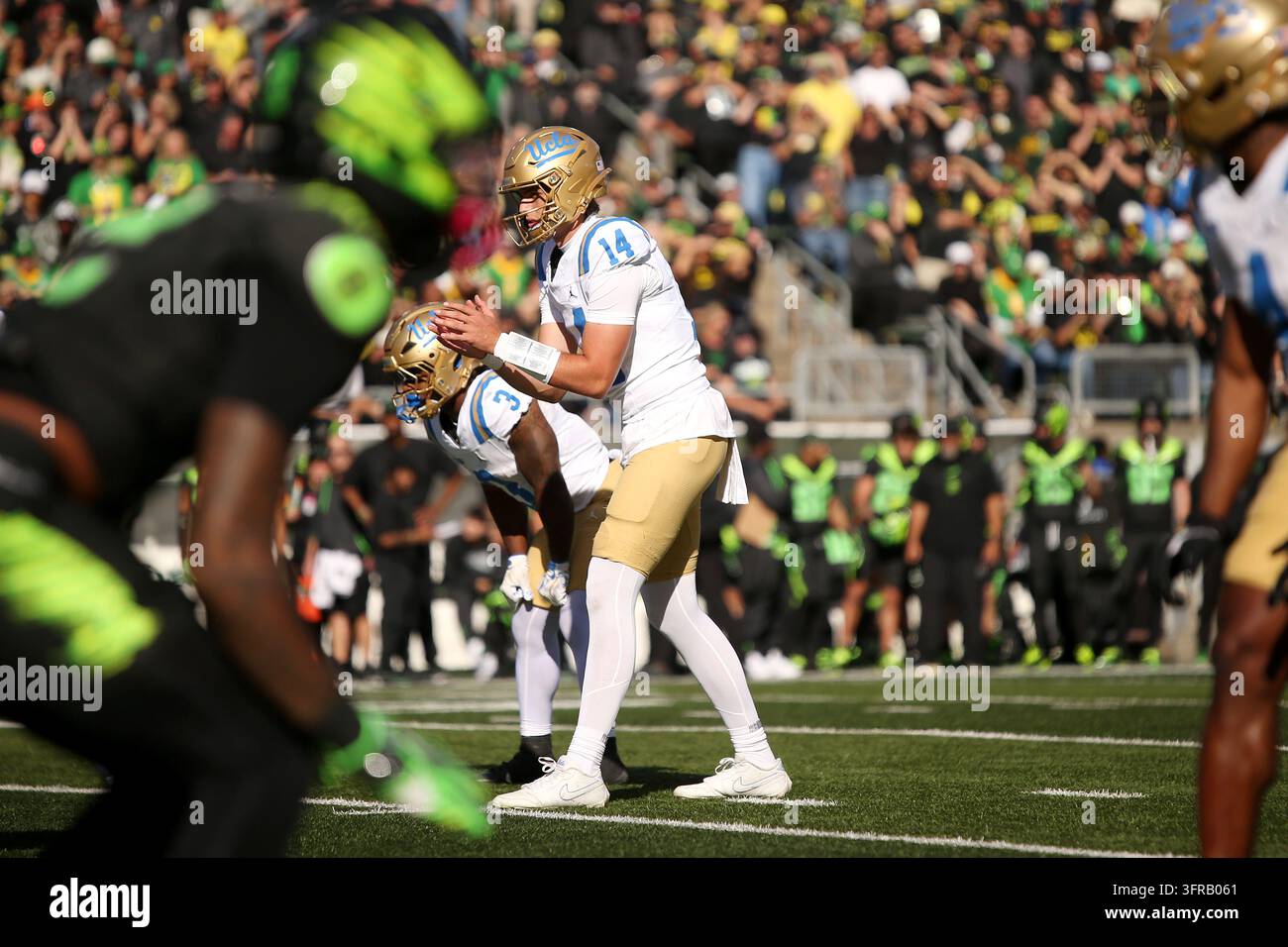 UCLA quarterback Ty Dieffenbach (14) sets up a play during the second ...