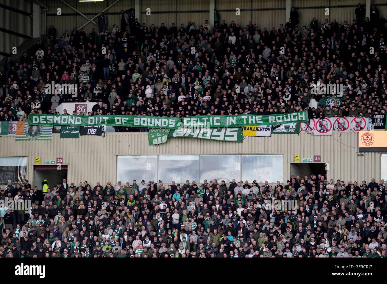 Celtic fans display banners protesting against Celtic board member ...